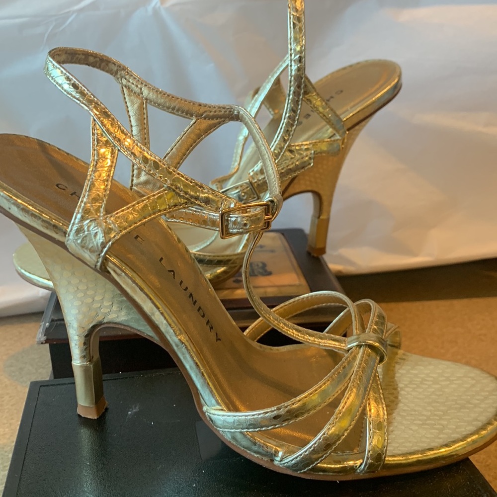 Gold heels very stylish sz 51/2 worn once price now firm